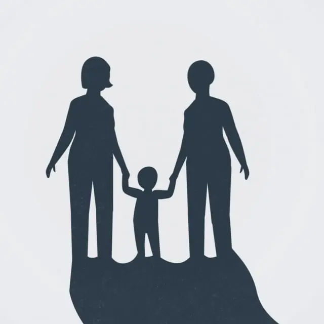 Silhouette of two parents holding a child's hands