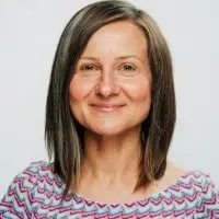 Portrait of a smiling woman with shoulder-length hair